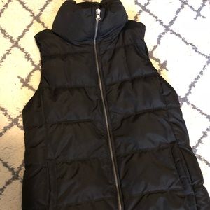 Black puffy vest with fleece lining size small